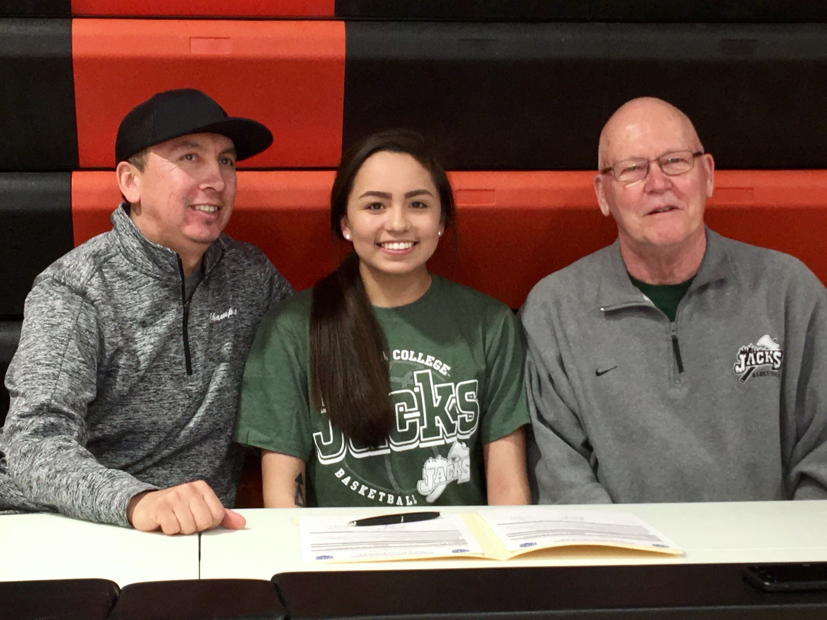 Melayna Four Bear of Killdeer will play for the Ladyjacks basketball team next season after signing a Letter of Intent last week.